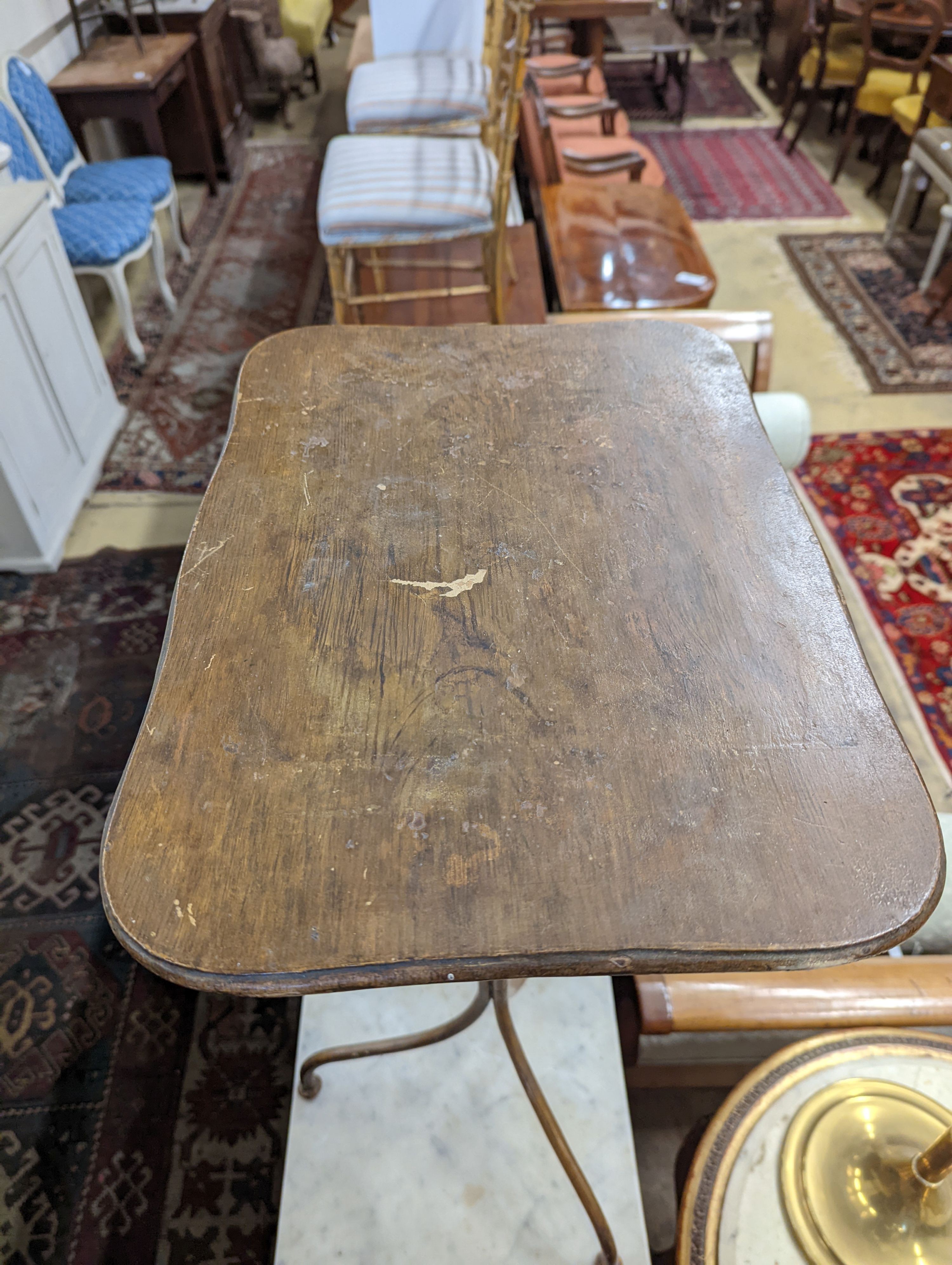 An early 20th century rectangular wrought iron tripod wine table with painted grain, width 44cm, depth 32cm, height 78cm